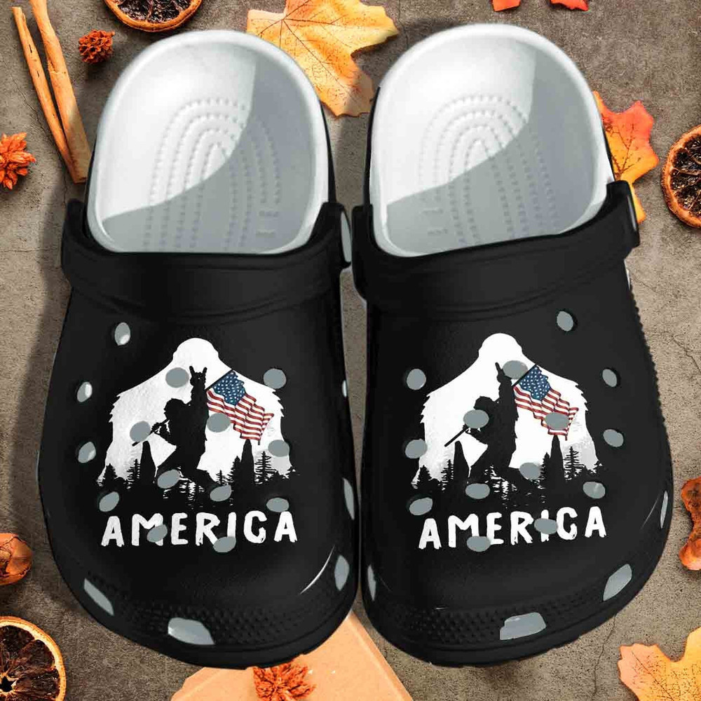 Bigfoot Holding Flag Shoes 4Th Of July America Black Gift For Lover Rubber Crocs Clog Shoes Comfy Footwear